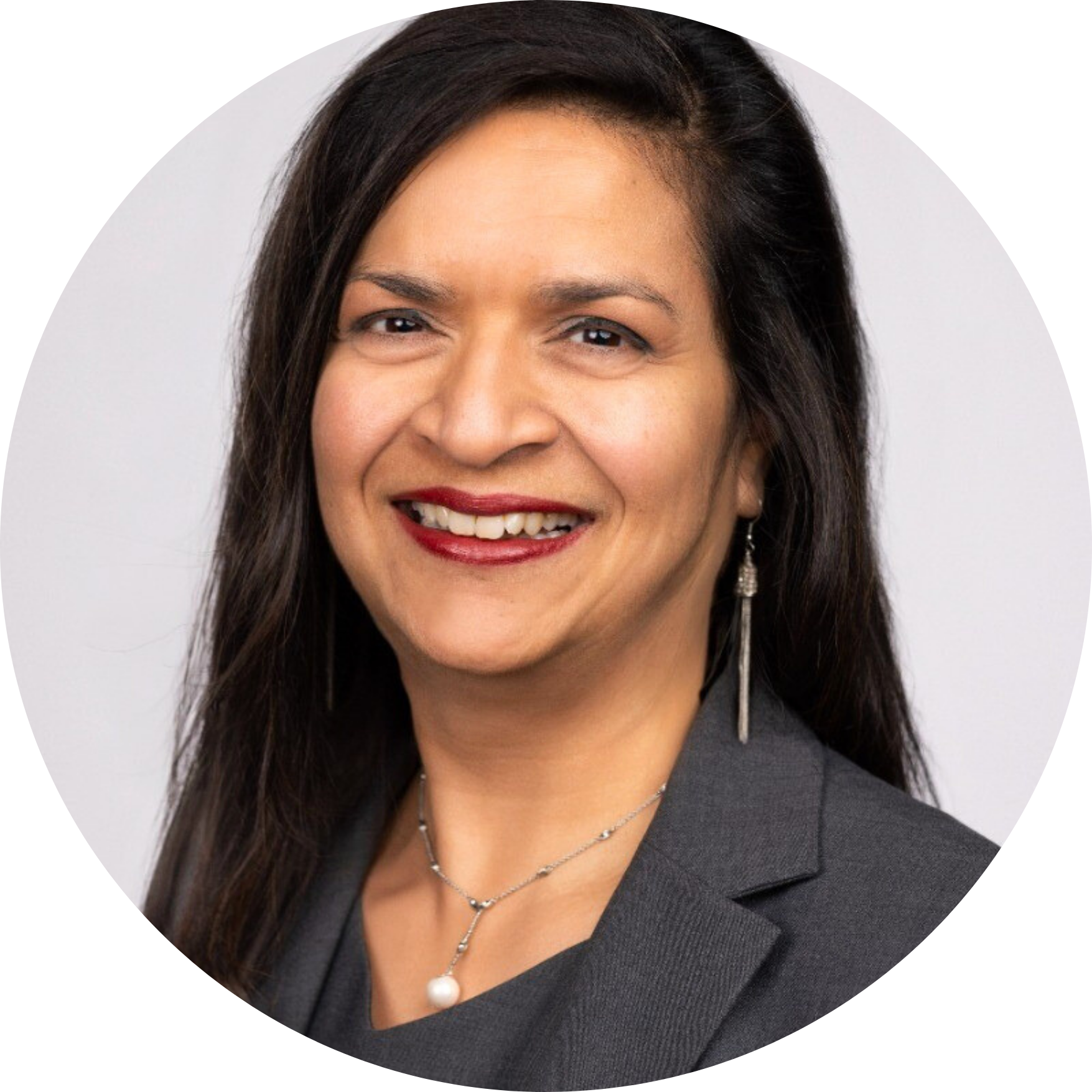Professional headshot of Maithreyee Dubé