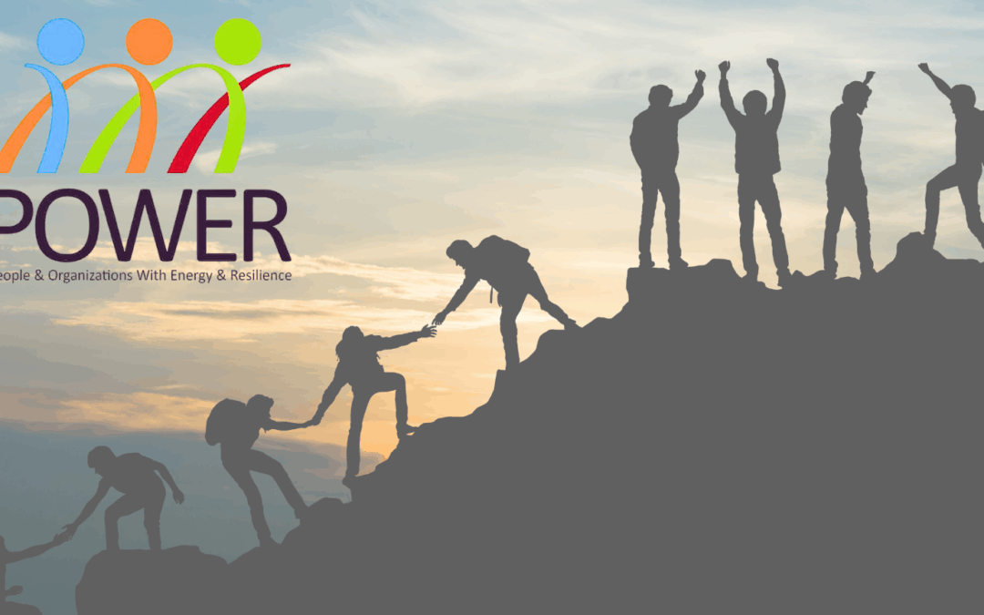 Photo of people helping each other up a mountain with the POWER program logo on it